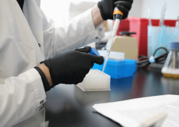 A pipette being used in the lab